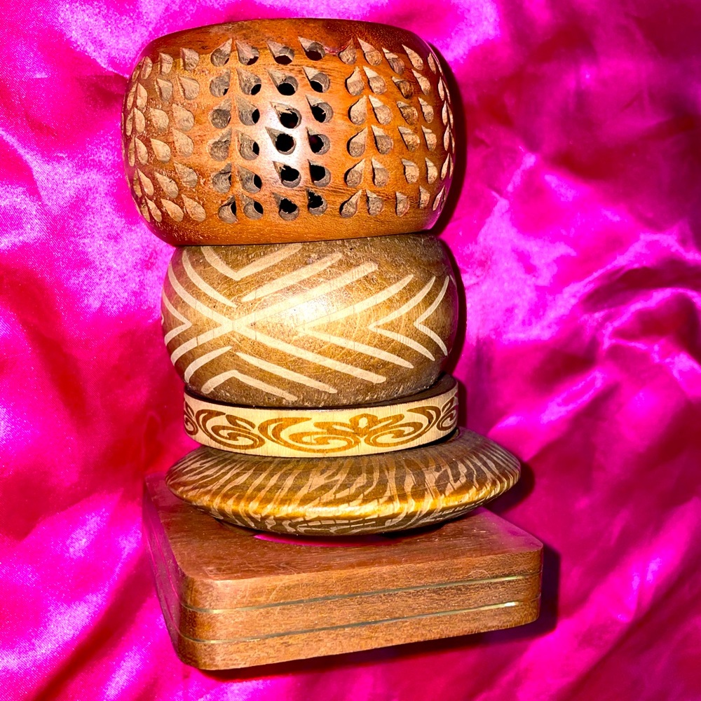 Vintage Sassy Jones wooden bracelets. These are from
different sets sold as one.